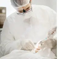 Dentist using tools