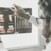 Dentist looking at x-ray
